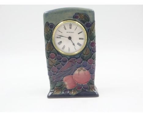 Boxed Moorcroft ceramic clock in the Pomegranate pattern. UK P&amp;P Group 2 (£20+VAT for the first lot and £4+VAT for subseq