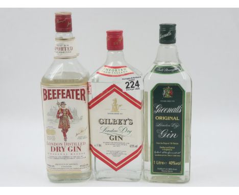 Three 1.0 litre bottles of gin, Beefeaters, Greenhalls and Gilbeys. UK P&amp;P Group 3 (£30+VAT for the first lot and £8+VAT 