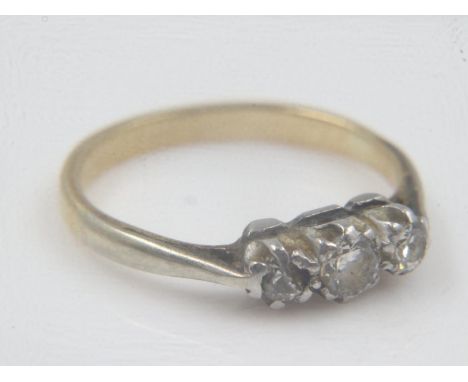 Unmarked yellow metal ring set with three diamonds, size J/K, 2.2g. UK P&amp;P Group 0 (£6+VAT for the first lot and £1+VAT f