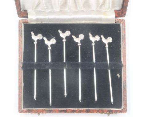 Collection of six boxed sterling silver cocktail sticks, box is in good condition, minor surface wear to base. UK P&amp;P Gro