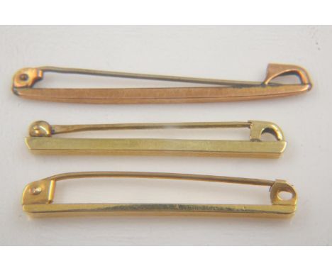 Three 9ct gold gentlemans tie pins, combined 3.6g. UK P&amp;P Group 0 (£6+VAT for the first lot and £1+VAT for subsequent lot