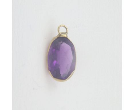 Natural oval cut amethyst in a 9ct gold bezel setting. UK P&amp;P Group 0 (£6+VAT for the first lot and £1+VAT for subsequent