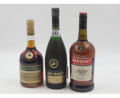 1.0 litre bottle of Bardinet VSOP brandy, 70cl of Three Barrels VSOP brandy and a Remy Martin VSOP 75cl example. UK P&amp;P G