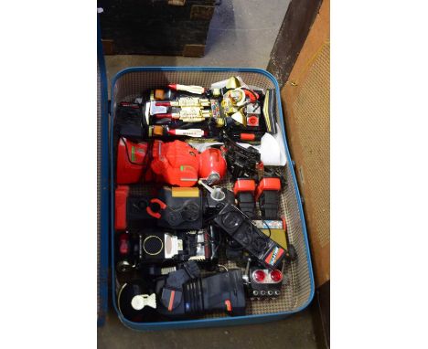 SUITCASE CONTAINING VINTAGE MOULDED PLASTIC TOY ROBOT AND VEHICLES