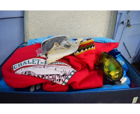 SUITCASE CONTAINING VINTAGE SKIING OUTFITS, GOGGLES, ETC