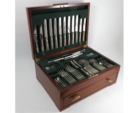 A cased silver canteen of Kings pattern cutlery, comprising eight dinner knives, eight tea knives, carving knife, fork and st
