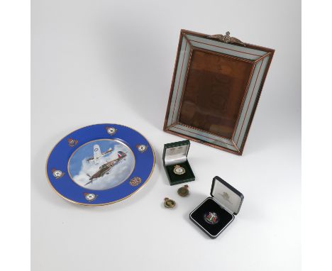 An Royal Flying Corps photograph frame, the base metal frame set with medal ribbon and RAF wings to the top, with leather cov