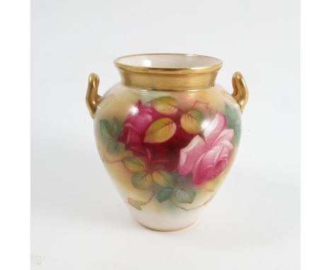 A Royal Worcester urn shaped vase, shape number 544, 1936, having two lug handles, height 3.75ins Condition report: Condition