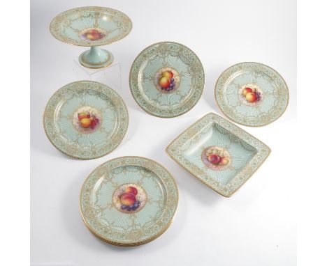 A Royal Worcester part dessert service, decorated with central panels of fruit by Richard Seabright, to a duck egg blue borde