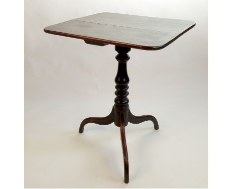 An oak rectangular occasional table, raised on a turned column terminating in umbrella tripod base, diameter 24ins