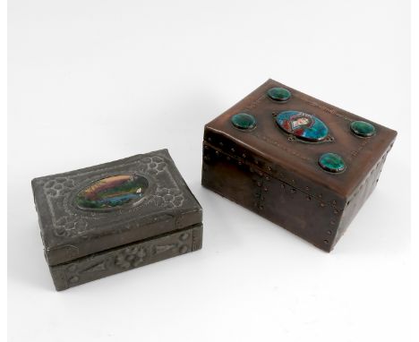 An Arts and Crafts copper covered box, of rectangular form, the cover decorated with four circular Ruskin style plaques and a