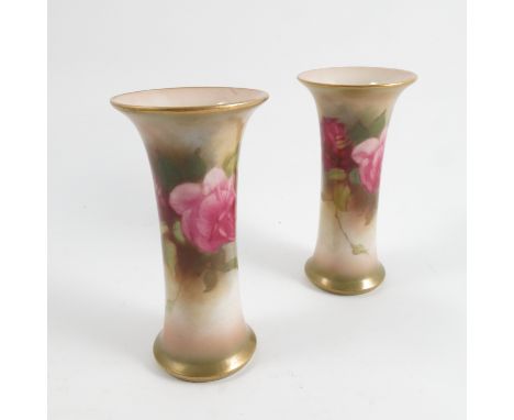 A pair of Royal Worcester spill vases, decorated with roses, shape number G923, 1933, height 4.5ins Condition report: Minor m