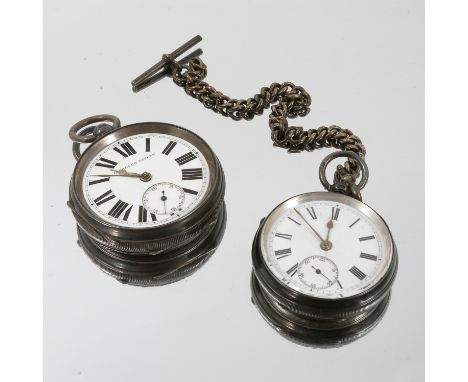 Two silver cased open face pocket watches, with engine turned cases, together with a silver curb link watch chain and T bar