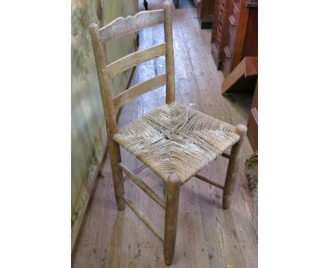 A set of sixteen ladder back chairs, by Gordon Russell, circa 1930s, with rush seats 