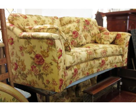 A Greensmith's Abbey three seater curved sofa, in floral upholstery, width approximately 72ins Condition report: Three pairs 