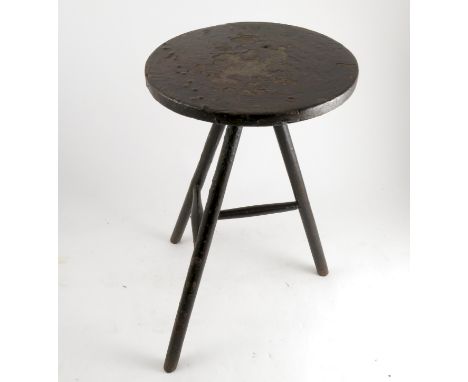 A small Georgian Welsh painted ash and elm primitive stick leg cricket table, the three tapering legs united by a T stretcher
