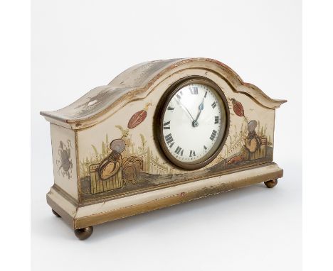 A 20th century mantel clock, the French movement with white enamel dial and Roman numerals, the case with shaped top decorate