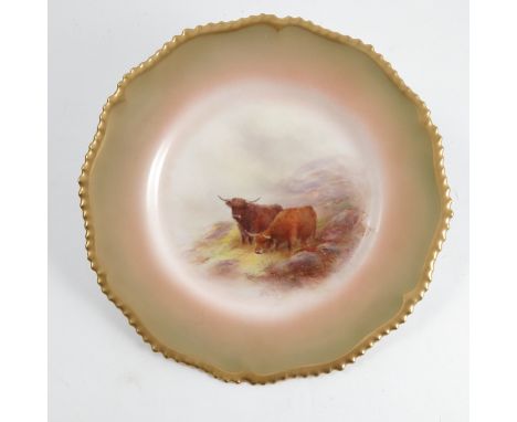 A Royal Worcester plate, decorated with highland cattle in a rocky landscape, to a shaded gilt border, circa 1912, diameter 1