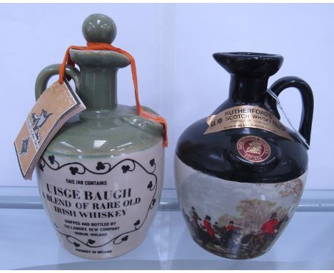 Tullamore Dew blended Irish Whiskey flagon with stopper, Rutherford's Scotch Whisky NV flagon, no stopper, 70cl (2)