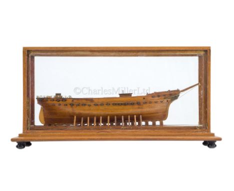 A WELL-PRESENTED SHIPWRIGHT'S MODEL OF A THREE-MASTED CLIPPER SHIP, LATE 19TH CENTURY the 10in. hull carved from contrasting 