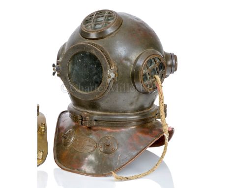 A THREE-BOLT SHALLOW DIVE HELMET BY C.E. HEINKE CO. LTD, LONDON, CIRCA 1920 constructed from beaten copper with maker's label
