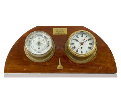 A BULKHEAD CLOCK AND BAROMETER SET FROM H.M.S. EXETER the clock (unsigned) with 6½in. enamel dial with single winding arbour 