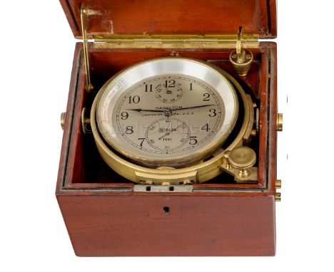 A TWO-DAY MODEL 21 MARINE CHRONOMETER BY HAMILTON, LANCASTER, PA, MID-20TH CENTURY with 4in. silvered dial, signed as per tit