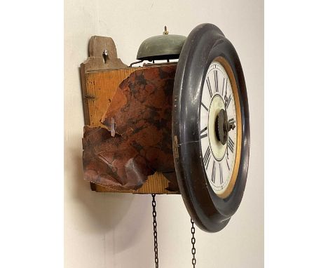An early 20th century Post Office alarm clock, the white dial set with Roman numerals, height 29cm.
