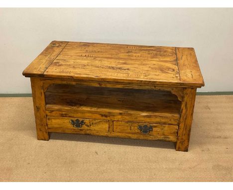 A contemporary wooden coffee table with a single shelf and two drawers, height 47cm, width 100cm wide, depth 59cm.