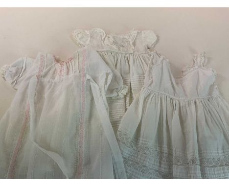 A collection of vintage christening gowns and petticoats, some in a/f condition (12).