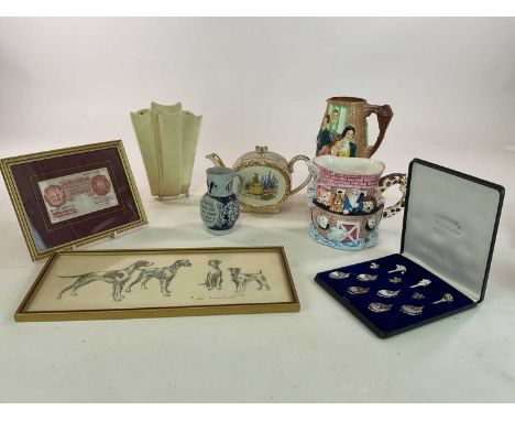 A quantity of collectors' items including a Woods wall pocket, a Sadler Crinoline teapot, silver plated commemorative spoons 