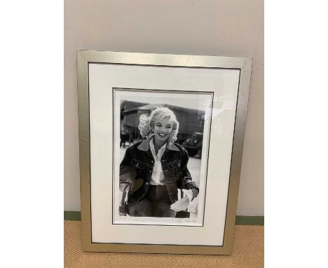 AFTER EVE ARNOLD; a limited edition black and white photographic print of Marilyn Monroe, 'Between Takes, The Misfits, 1960',