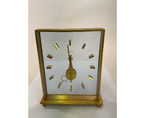 JAEGER LECOULTRE; a 1960s perspex and lacquered brass skeleton clock, signed to the dial, height 20cm.Condition Report: Clock