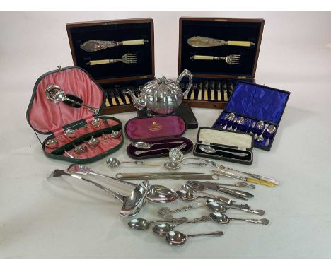 A quantity of silver plate, including teapot, cased flatware, etc.