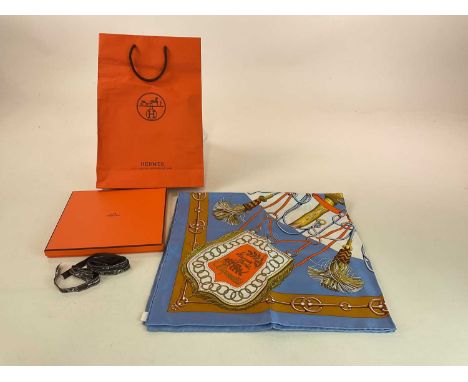 HERMES; a boxed 'Cliquetis' silk scarf in ciel colourway, designed by Julie Abadie in original packaging, includes box ribbon