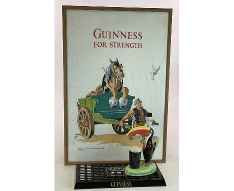 GUINNESS INTEREST; a Carlton ware Guiness toucan lamp base (a/f), a framed and glazed vintage linen tea cloth and a beer Carl