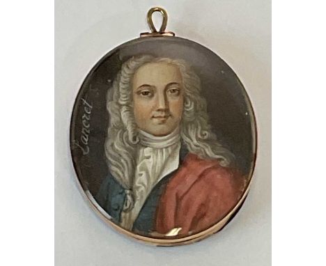 X An 18th/19th century English portrait miniature depicting a gentleman wearing wig with white stock, in rose gold coloured f