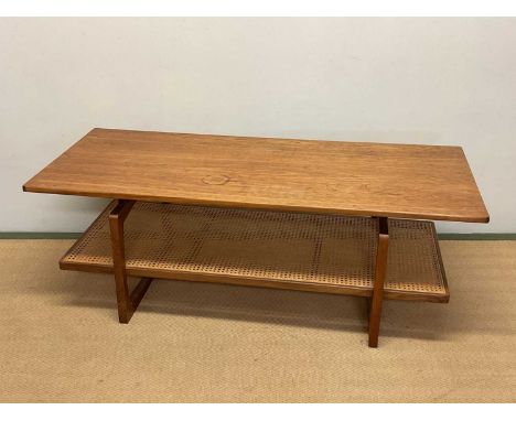 G-PLAN; a mid 20th century Quadrille range teak and afromosia coffee table with rattan magazine shelf, height 46cm, width 130