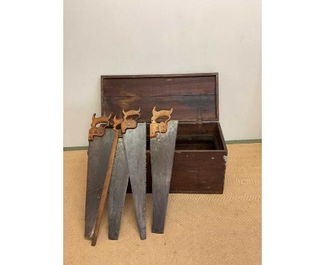 A late 19th/early 20th century tool chest containing a large quantity of tools including many wooden handled chisels, some wi