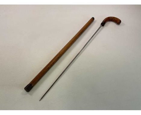 A late Victorian sword stick with tapering four sided blade, length 92cm.