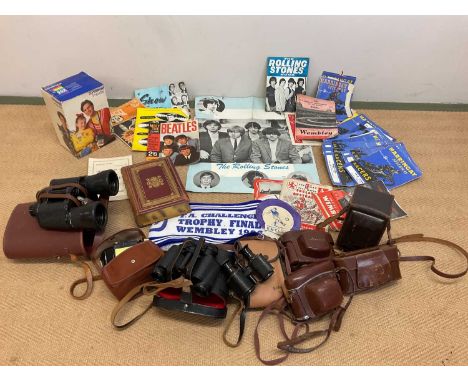 Collectors' items including pop memorabilia (Beatles and Rolling Stones), speedway programmes, cameras and binoculars, a book