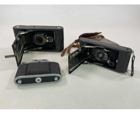 Two vintage Kodak bellows cameras, and another (3)