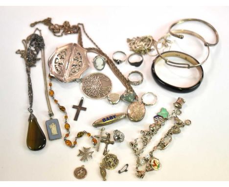 A collection of silver jewellery, including bangle, pendants, rings, etc.