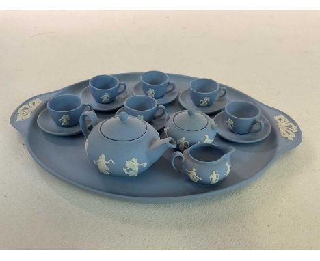 WEDGWOOD; a miniature jasperware teaset, 'Dancing Hours', to include teapot, jug, sugar bowl, six cups and saucers and a tray