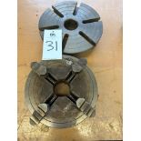 (1) 10" 4-jaw chuck, (1) 11" chuck.