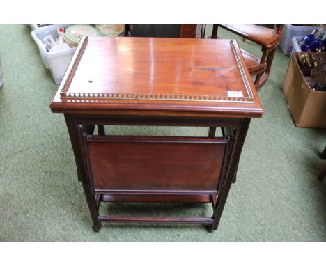 Edwardian Fold over Card table with 4 hinged shelves over tapering legs 