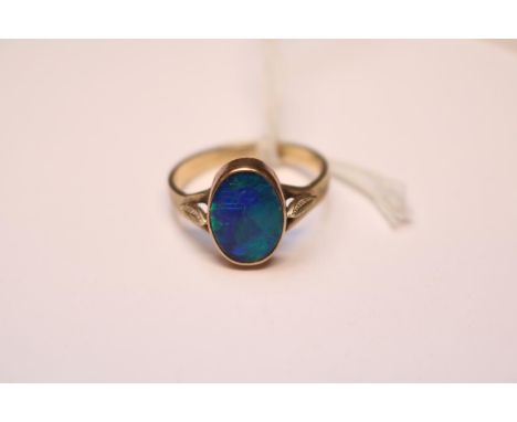 Ladies 9ct Gold Oval Opal rub over set ring Size Q. 2.7g total weight 