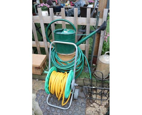 Hosepipe on reel, Vintage Watering Can and a Stoneware pot 