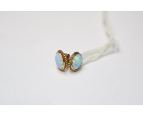 Pair of 9ct Gold Oval Opal set earrings 0.8g total weight 