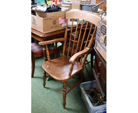 Elm County Elbow chair with stick back over turned legs 